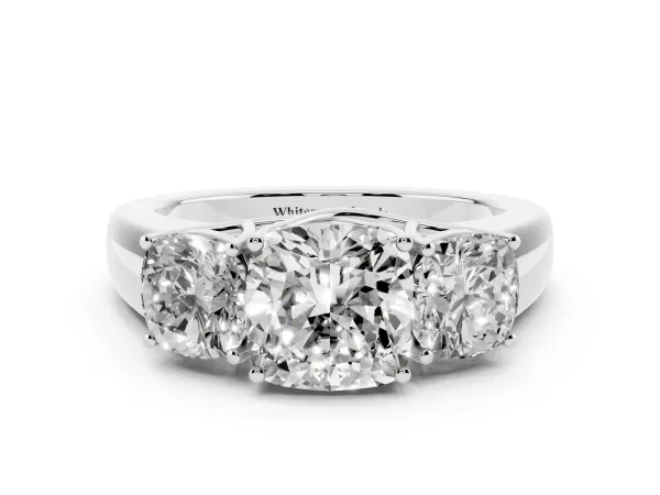 Three-Stone Cushion Cut Cut Diamond Ring with Prong Setting and Classic Band Platinum