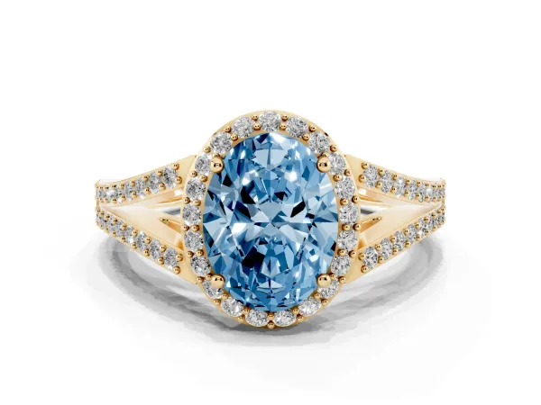 Fancy Blue Oval Cut Halo Split Shank Diamond Ring with Prong Setting Yellow gold