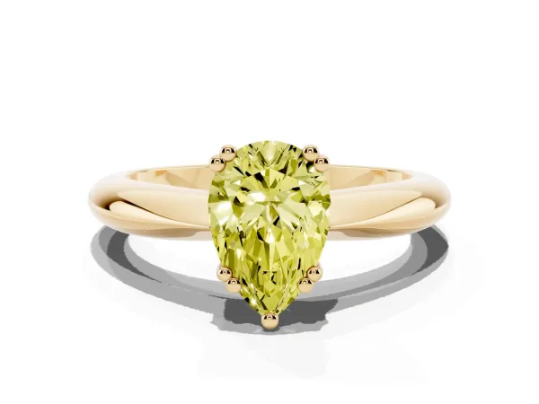 Fancy Yellow Pear Cut Cut Solitaire Engagement Ring with Tapered Band and Four-Prong Setting Yellow gold