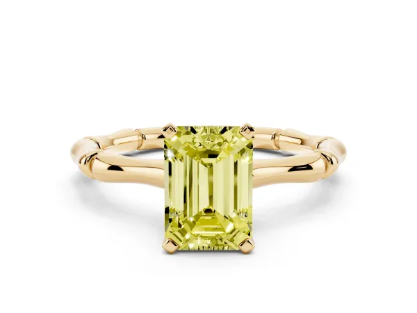 Fancy Yellow Emerald Cut Solitaire Diamond Ring with Bamboo Band and Four-Prong Setting Yellow gold