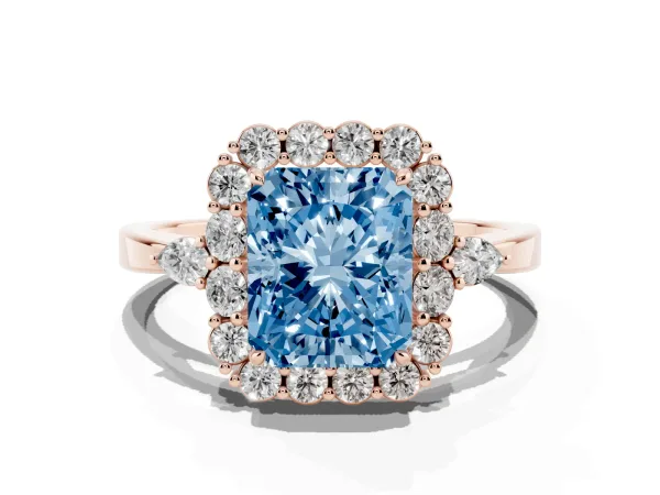 Fancy Blue Radiant Cut Diamond Halo Ring with Pear Side Stones and Prong Setting Rose gold