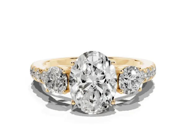 Oval Cut Cut Diamond Three-Stone Ring with Round Side Stones and Pavé Band Yellow gold