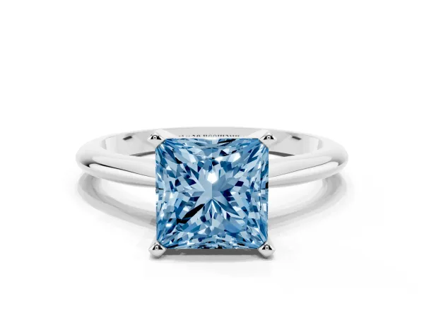 Fancy Blue Princess Cut Cut Solitaire Ring with Four-Prong Setting on a Classic Band Platinum