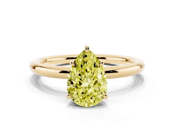 Fancy Yellow Pear Cut Solitaire Diamond Ring with Four-Prong Setting on a Plain Band Yellow gold