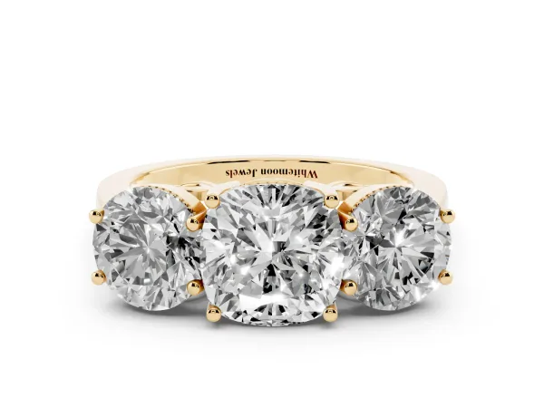 Three-Stone Cushion Cut Diamond Engagement Ring with Prong Setting on a Classic Band Yellow gold