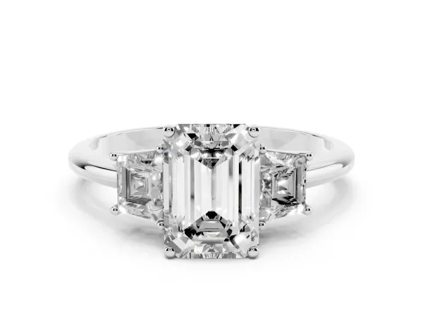 Emerald Cut Diamond Three-Stone Ring with Trapezoid Side Stones and Prong Setting Platinum
