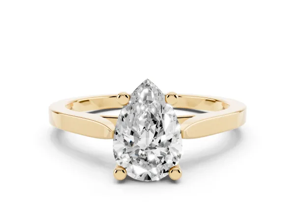 Pear Cut Solitaire Diamond Ring with Four-Prong Setting and Tapered Band Yellow gold