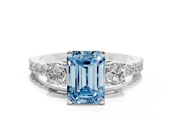 Fancy Blue Emerald Cut Three-Stone Diamond Pavé Band with Prong Setting Platinum