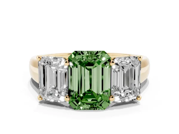Fancy Green Emerald Cut Three-Stone Diamond Ring with Prong Setting on a Classic Band Yellow gold