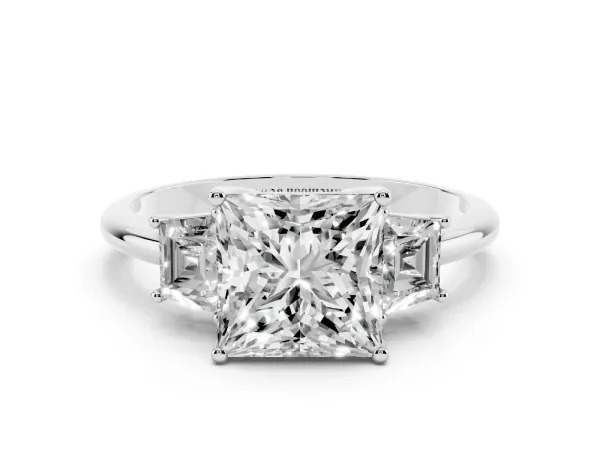 Princess Cut Diamond Three-Stone Ring with Trapezoid Side Stones and Prong Setting Platinum