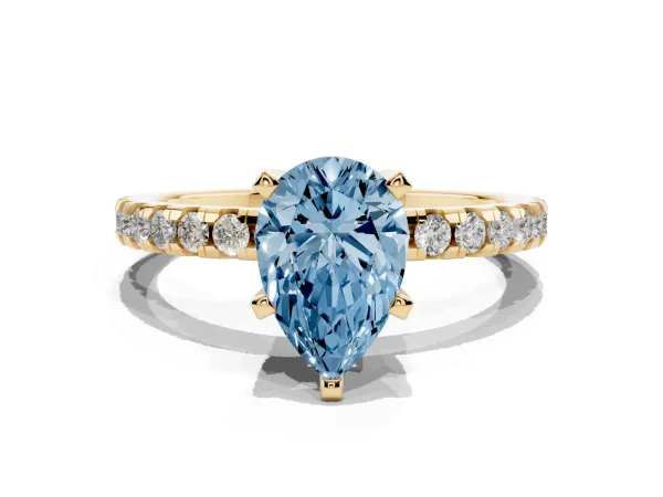 Fancy Blue Pear Cut Diamond Solitaire Ring with Round Pavé Band and Four-Prong Setting Yellow gold