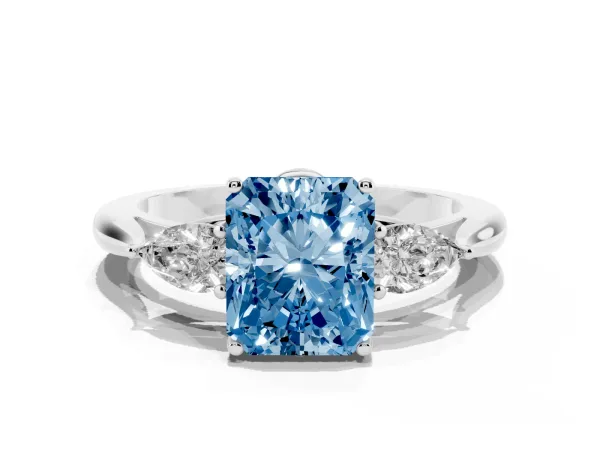 Fancy Blue Radiant Cut Diamond Three-Stone Ring with Pear Side Stones and Prong Setting Platinum