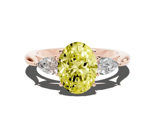Fancy Yellow Three-Stone Oval Cut Brilliant Diamond Solitaire Ring with Tapered Band and Four-Prong Setting Rose gold