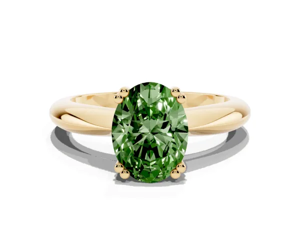 Fancy Green Oval Cut Cut Solitaire Engagement Ring with Tapered Band and Four-Prong Setting Yellow gold