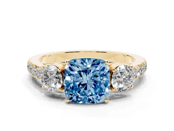 Fancy Blue Cushion Cut Cut Diamond Three-Stone Ring with Round Side Stones and Pavé Band Yellow gold