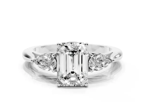 Three-Stone Emerald Cut Brilliant Diamond Solitaire Ring with Tapered Band and Four-Prong Setting Platinum