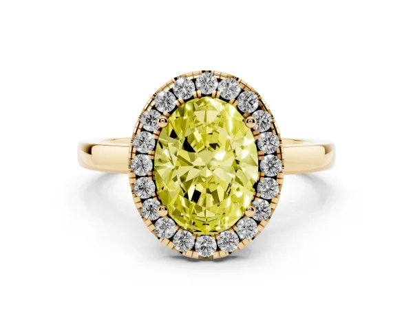 Fancy Yellow Oval Cut Halo Diamond Solitaire with Pavé Band and Four-Prong Setting Yellow gold