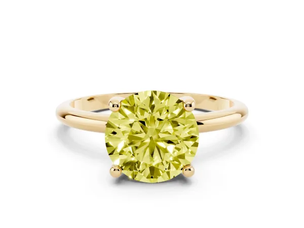 Fancy Yellow Round Cut Solitaire Diamond Ring with 4-Prong Setting on a Classic Band Yellow gold