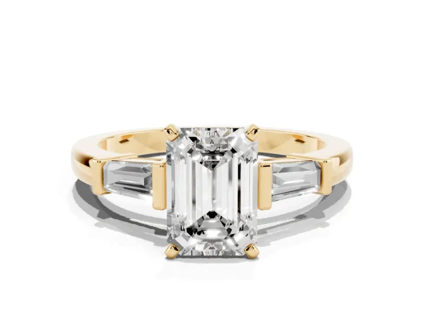 Emerald Cut Cut Diamond Solitaire Ring with Tapered Baguette Accents and Four-Prong Setting Yellow gold