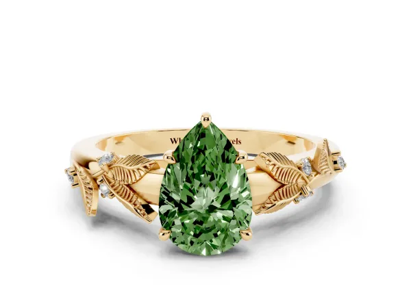 Fancy Green Pear Cut Diamond Solitaire Ring with Leaf Motif Band and Four-Prong Setting Yellow gold