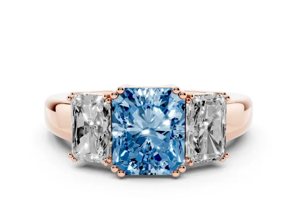 Fancy Blue Three-Stone Radiant Cut Cut Diamond Ring with Channel Set Band and Four-Prong Setting Rose gold