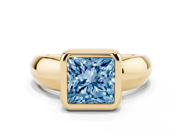 Fancy Blue Bezel Set Princess Cut Solitaire Ring with Wide Band Yellow gold