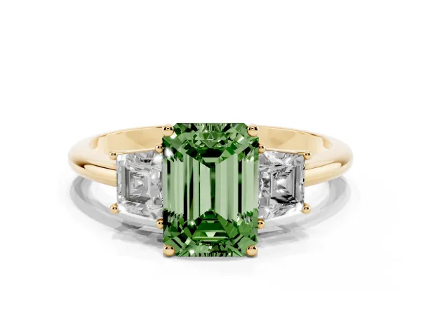 Fancy Green Emerald Cut Diamond Three-Stone Ring with Trapezoid Side Stones and Prong Setting Yellow gold