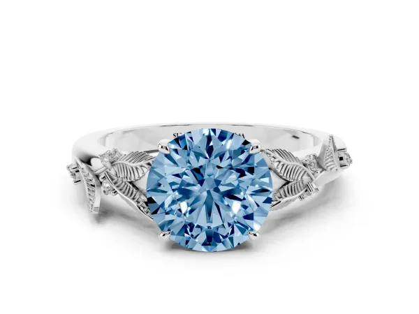 Fancy Blue Round Cut Diamond Solitaire Ring with Leaf Motif Band and Four-Prong Setting Platinum