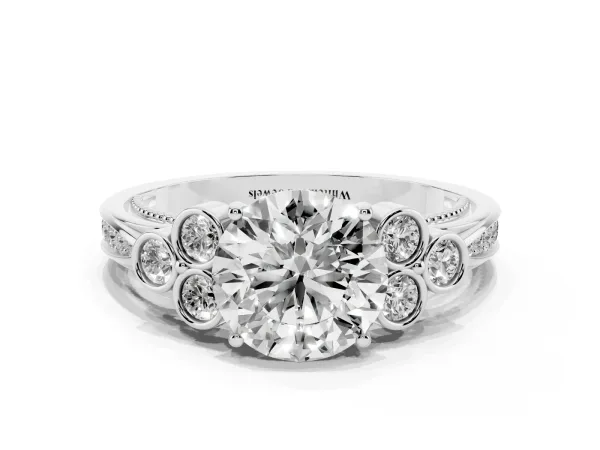 Round Cut Cut Diamond Engagement Ring with Bezel Set Round Side Stones and Prong Setting Platinum