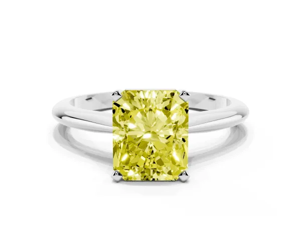 Fancy Yellow Radiant Cut Cut Solitaire Ring with Four-Prong Setting on a Classic Band Platinum