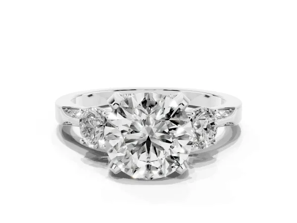 Round Cut Brilliant Three-Stone Diamond Ring with Pavé Band and Four-Prong Setting White gold