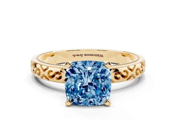 Fancy Blue Cushion Cut Solitaire Engagement Ring with Scrollwork Band and Four-Prong Setting Yellow gold
