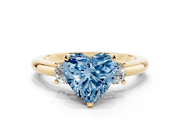 Fancy Blue Three-Stone Heart Cut Cut Diamond Solitaire with Prong Setting and Classic Band Yellow gold