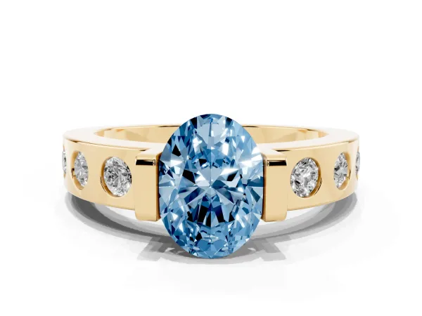 Fancy Blue Oval Cut Brilliant Channel-Set Diamond Ring with Bezel Prong Setting Yellow gold