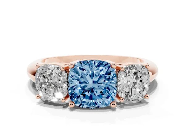 Fancy Blue Three-Stone Cushion Cut Cut Diamond Engagement Ring with Prong Setting on a White Gold Band Rose gold