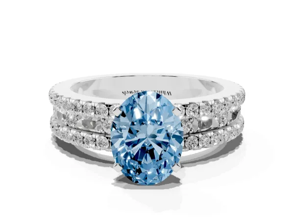 Fancy Blue Oval Cut Diamond Solitaire Ring with Pavé and Channel Set Band Platinum