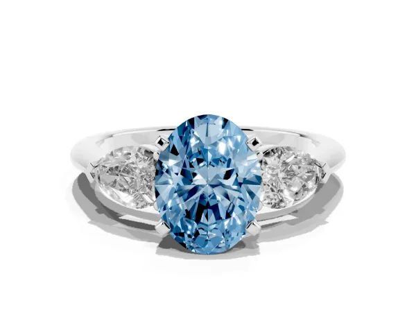 Fancy Blue Three-Stone Oval Cut Diamond Ring with Pear Side Stones and Four-Prong Setting Platinum