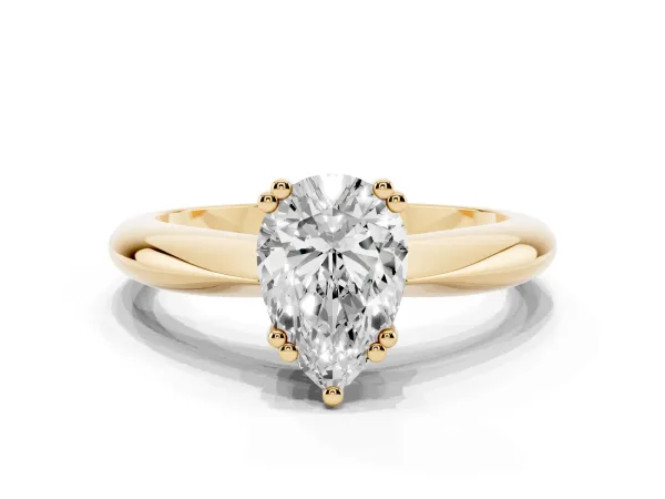 Pear Cut Cut Solitaire Engagement Ring with Tapered Band and Four-Prong Setting Yellow gold
