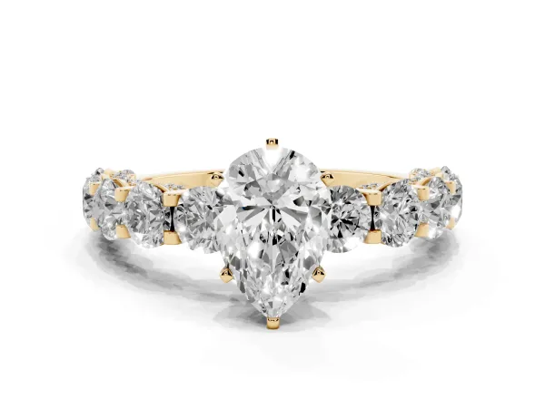 Pear Cut Diamond Side Stone Engagement Ring with Four-Prong Setting Yellow gold