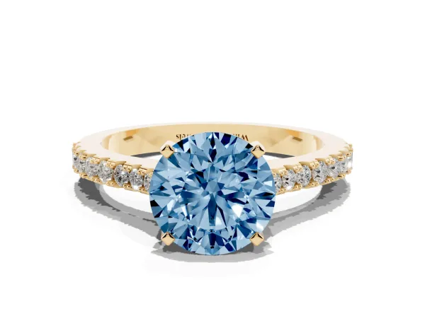 Fancy Blue Round Cut Cut Solitaire Diamond Engagement Ring with Pave Band and Four-Prong Setting Yellow gold