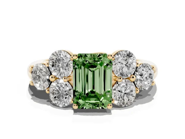 Fancy Green Emerald Cut Cut Diamond Cluster Ring with Round Accent Stones and Prong Setting on a Classic Band Yellow gold