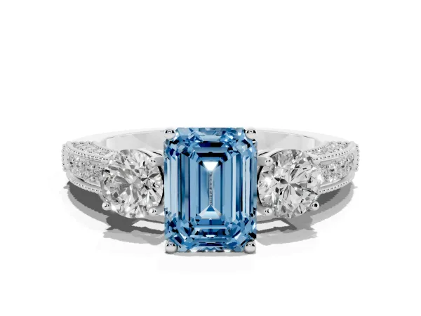 Fancy Blue Emerald Cut Three-Stone Diamond Ring with Pavé Band and Four-Prong Setting White gold