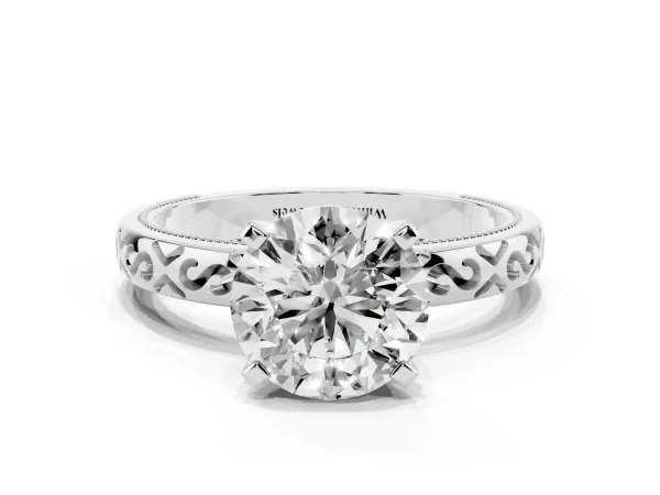Round Cut Solitaire Engagement Ring with Scrollwork Band and Four-Prong Setting White gold
