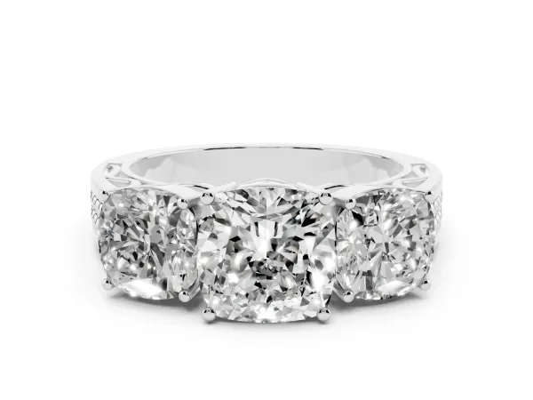 Cushion Cut Diamond Three-Stone Ring with Prong Setting and Textured Band Platinum
