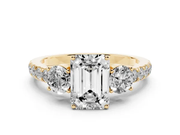 Emerald Cut Cut Diamond Three-Stone Ring with Round Side Stones and Pavé Band Yellow gold