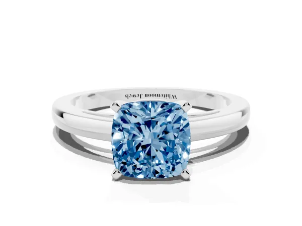 Fancy Blue Cushion Cut Solitaire Diamond Engagement Ring with Four-Prong Setting on a Classic Band Platinum