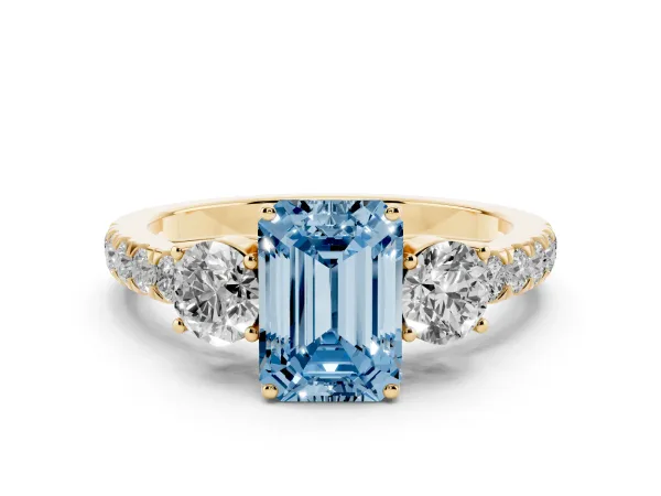 Fancy Blue Emerald Cut Cut Diamond Three-Stone Ring with Round Side Stones and Pavé Band Yellow gold