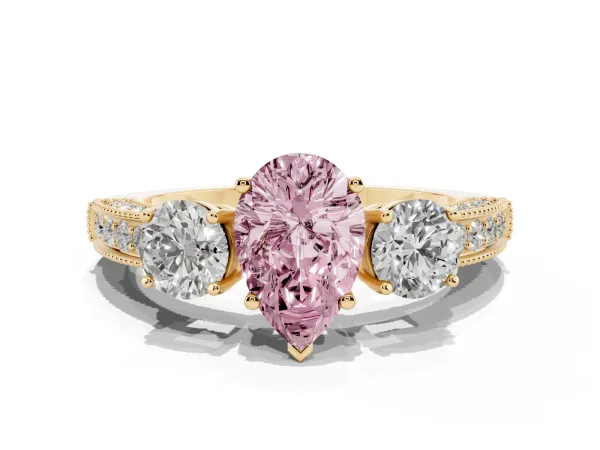 Fancy Pink Pear Cut Three-Stone Diamond Ring with Pavé Band and Four-Prong Setting Yellow gold