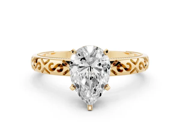 Pear Cut Solitaire Engagement Ring with Scrollwork Band and Four-Prong Setting Yellow gold