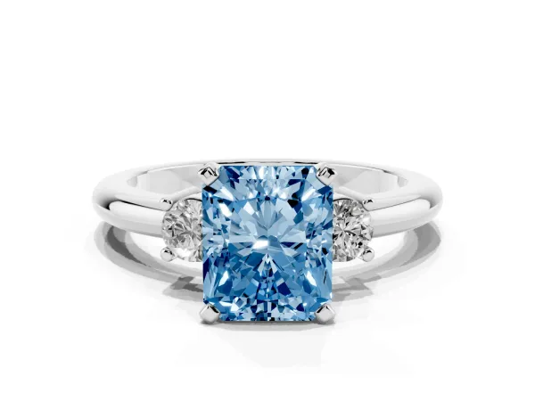 Fancy Blue Three-Stone Radiant Cut Cut Diamond Solitaire with Prong Setting and Classic Band Platinum